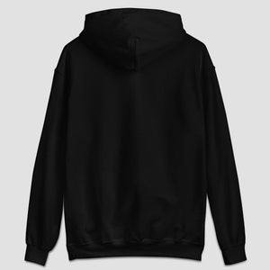 Back view of a black hoodie on a light gray background.