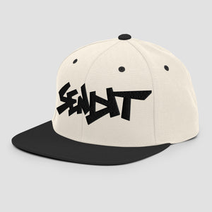 An off-white snapback cap with a black flat brim and a black embroidered stylized 'SENDIT' logo on the front, shown against a light gray background.