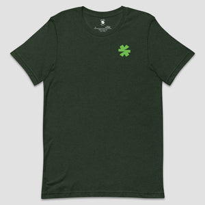 A dark forest green crewneck t-shirt with a small bright green asterisk printed on the left chest, displayed flat against a light gray background.