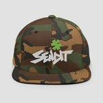 A camouflage flat-brim cap with a green asterisk graphic and white embroidered 'SENDIT' text on the front, shown against a light gray background.