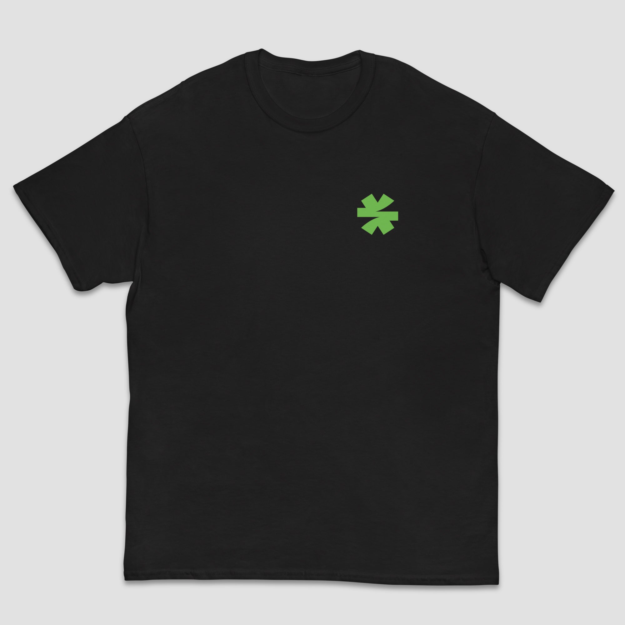 A black short-sleeve crewneck t-shirt with a small green asterisk on the left chest, displayed against a solid light gray background.