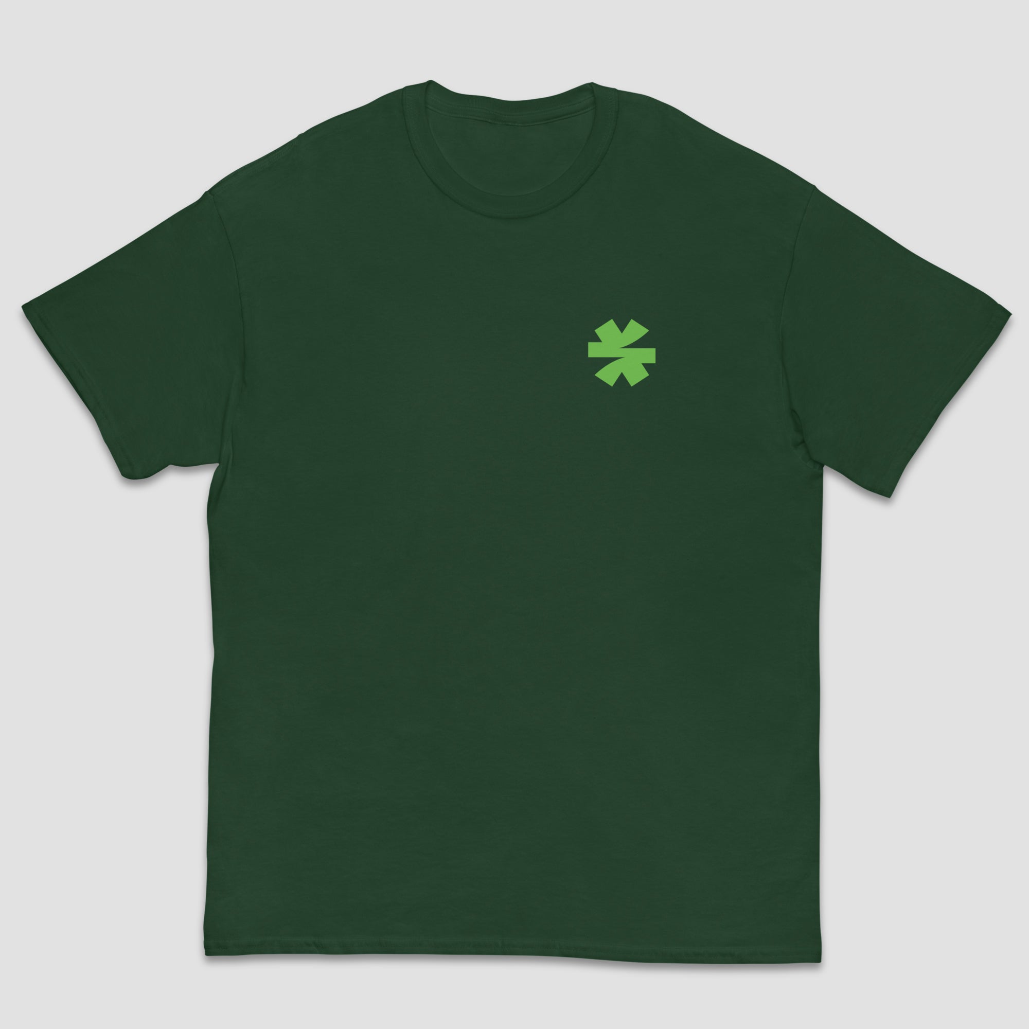 A dark green crewneck t-shirt with a small light green asterisk on the left chest, displayed against a solid light gray background.