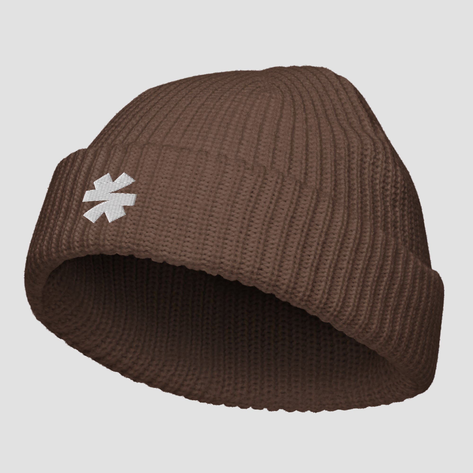 A brown ribbed knit beanie hat with a small white embroidered asterisk logo on the front cuff, shown against a light gray background.