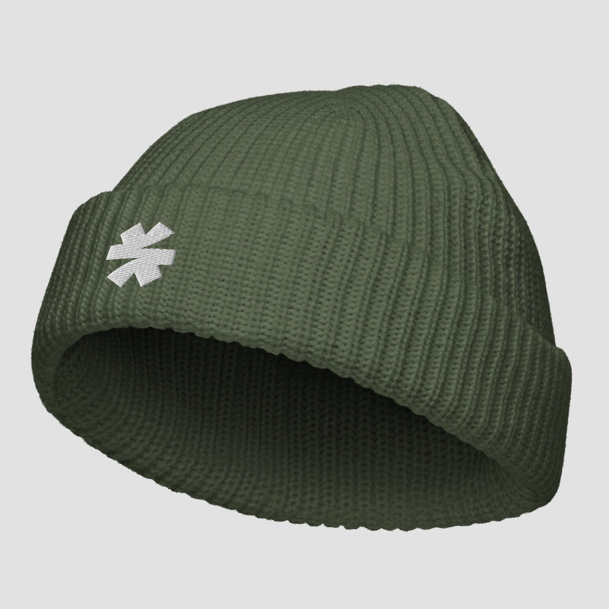 An olive green ribbed knit beanie hat with a white asterisk symbol embroidered on the front cuff, shown against a solid light gray background.