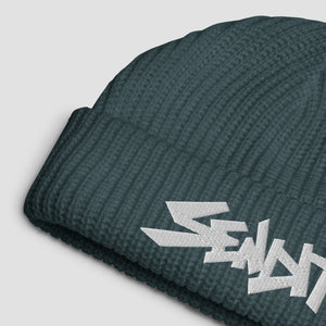 Blue-gray beanie with 'SENDIT' embroidery on a light gray background