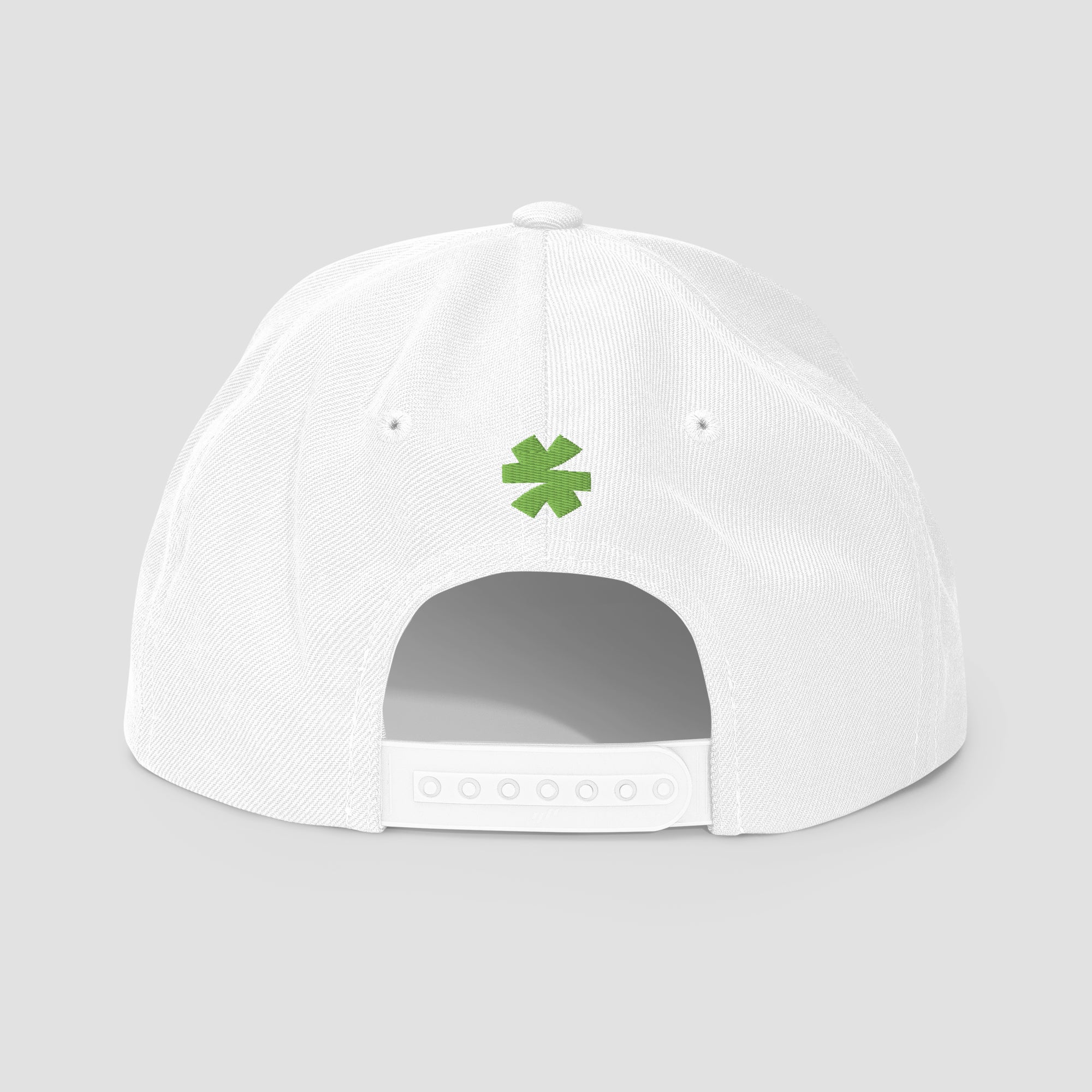 White snapback cap shown from the back, featuring a small green asterisk centered above the adjustable snap closure, on a light gray background.