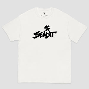 A white short-sleeve crewneck t-shirt featuring a black graffiti-style graphic on the chest that reads 'SEND IT' with an asterisk symbol above the letters, displayed on a light gray background.
